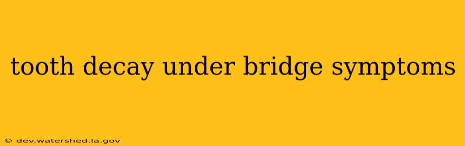 tooth decay under bridge symptoms
